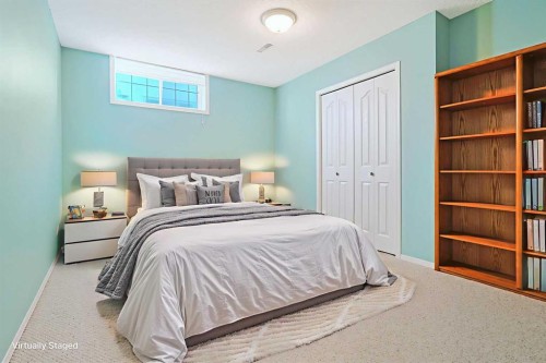 108 Hamptons Heights Nw, Calgary, AB - Indoor Photo Showing Bedroom
