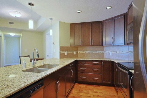 609-16 Varsity Estates Circle Nw, Calgary, AB - Indoor Photo Showing Kitchen With Double Sink With Upgraded Kitchen