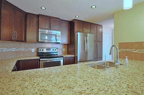 609-16 Varsity Estates Circle Nw, Calgary, AB - Indoor Photo Showing Kitchen With Stainless Steel Kitchen With Double Sink