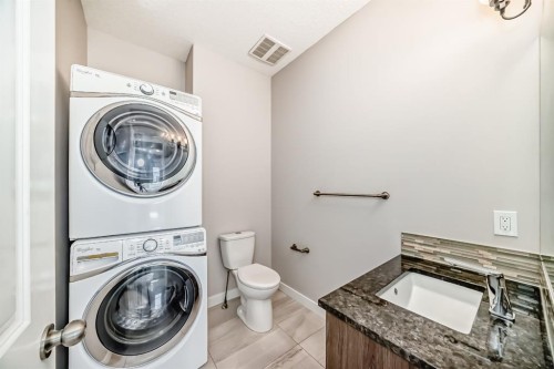 46 Panora Street Nw, Calgary, AB - Indoor Photo Showing Laundry Room