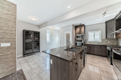 46 Panora Street Nw, Calgary, AB - Indoor Photo Showing Kitchen With Double Sink With Upgraded Kitchen