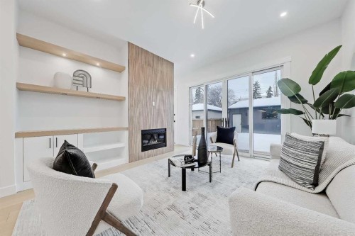 422 14 Avenue Ne, Calgary, AB - Indoor Photo Showing Other Room With Fireplace