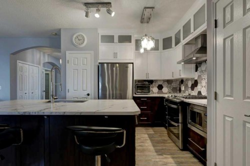 18380 Chaparral Street Se, Calgary, AB - Indoor Photo Showing Kitchen With Double Sink