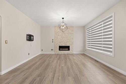 165 Canals Circle Sw, Airdrie, AB - Indoor With Fireplace