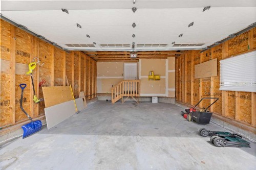 165 Canals Circle Sw, Airdrie, AB - Indoor Photo Showing Garage