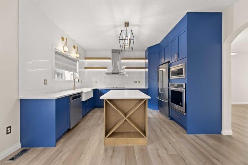 165 Canals Circle Sw, Airdrie, AB - Indoor Photo Showing Kitchen With Upgraded Kitchen