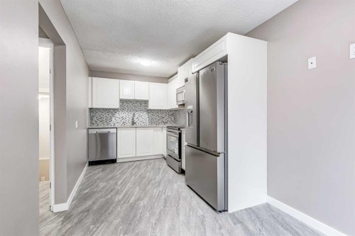 4316 4A Avenue, Calgary, AB - Indoor Photo Showing Kitchen With Stainless Steel Kitchen