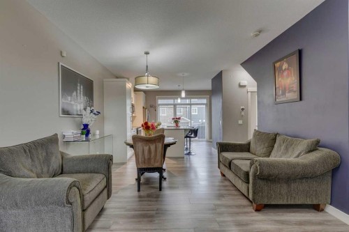 659 Evanston Manor Nw, Calgary, AB - Indoor Photo Showing Living Room