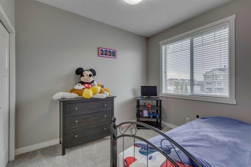 659 Evanston Manor Nw, Calgary, AB - Indoor Photo Showing Bedroom
