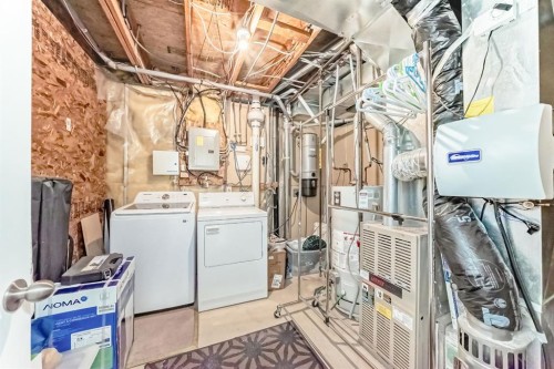 158 Somervale Close Sw, Calgary, AB - Indoor Photo Showing Laundry Room