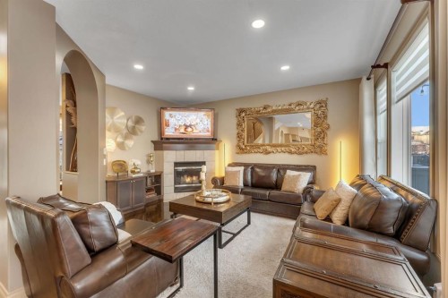 149 West Creek Boulevard, Chestermere, AB - Indoor Photo Showing Living Room With Fireplace