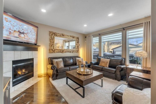 149 West Creek Boulevard, Chestermere, AB - Indoor Photo Showing Living Room With Fireplace