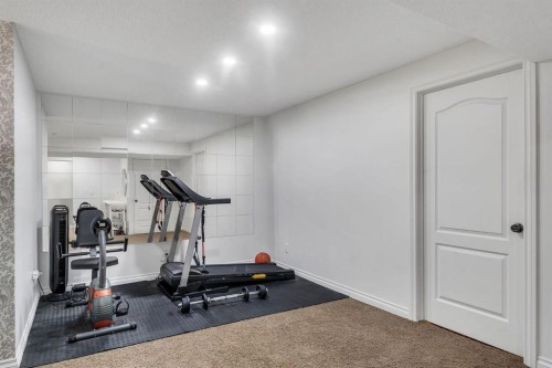 149 West Creek Boulevard, Chestermere, AB - Indoor Photo Showing Gym Room
