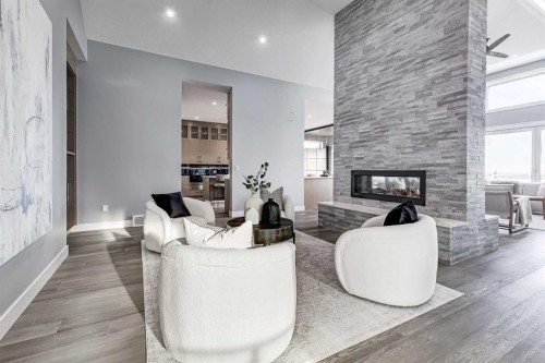 26 Patina Hill Sw, Calgary, AB - Indoor Photo Showing Living Room With Fireplace