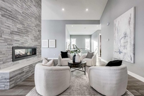 26 Patina Hill Sw, Calgary, AB - Indoor Photo Showing Living Room With Fireplace