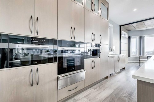 26 Patina Hill Sw, Calgary, AB - Indoor Photo Showing Kitchen With Upgraded Kitchen
