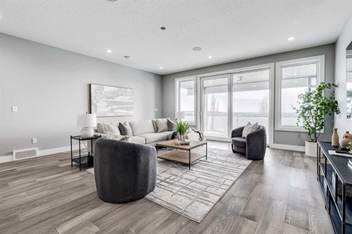 26 Patina Hill Sw, Calgary, AB - Indoor Photo Showing Living Room