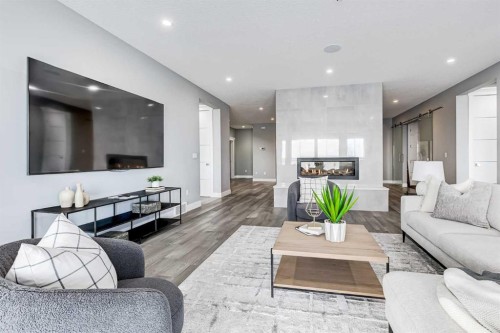 26 Patina Hill Sw, Calgary, AB - Indoor Photo Showing Living Room
