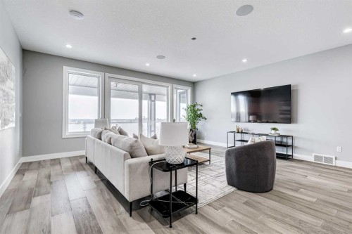 26 Patina Hill Sw, Calgary, AB - Indoor Photo Showing Living Room