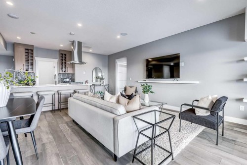 26 Patina Hill Sw, Calgary, AB - Indoor Photo Showing Living Room