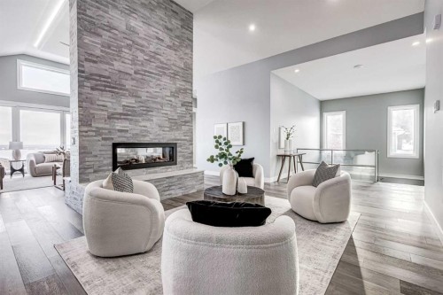 26 Patina Hill Sw, Calgary, AB - Indoor Photo Showing Living Room With Fireplace