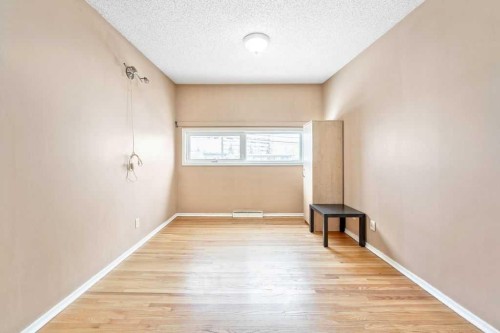 706 68 Avenue Sw, Calgary, AB - Indoor Photo Showing Other Room