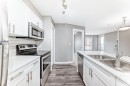 606-20 Kincora Glen Park Nw, Calgary, AB  - Indoor Photo Showing Kitchen With Stainless Steel Kitchen With Upgraded Kitchen 