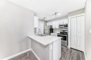 606-20 Kincora Glen Park Nw, Calgary, AB  - Indoor Photo Showing Kitchen With Stainless Steel Kitchen With Double Sink 