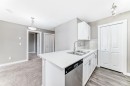606-20 Kincora Glen Park Nw, Calgary, AB  - Indoor Photo Showing Kitchen With Double Sink 