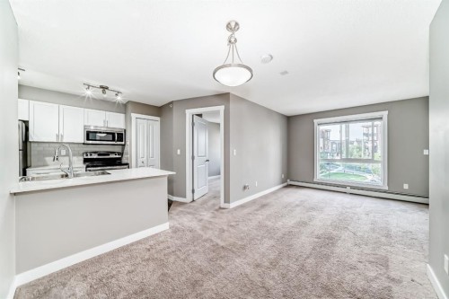 606-20 Kincora Glen Park Nw, Calgary, AB - Indoor Photo Showing Kitchen With Double Sink