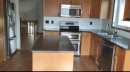 72 Herder Drive, Sylvan Lake, AB  - Indoor Photo Showing Kitchen With Stainless Steel Kitchen With Double Sink 