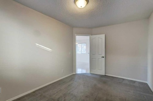 36 Brightondale Crescent Se, Calgary, AB - Indoor Photo Showing Other Room