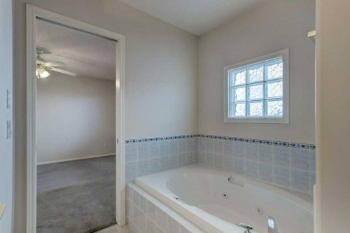 36 Brightondale Crescent Se, Calgary, AB - Indoor Photo Showing Bathroom