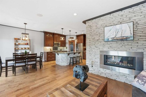166 Fireside Bend, Cochrane, AB - Indoor Photo Showing Living Room With Fireplace
