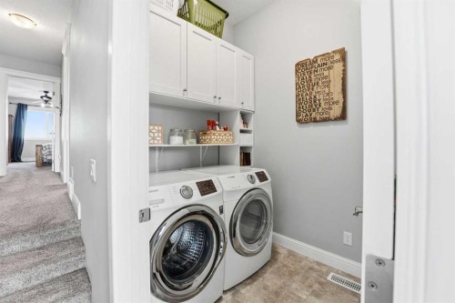 166 Fireside Bend, Cochrane, AB - Indoor Photo Showing Laundry Room