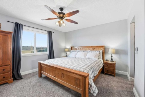 166 Fireside Bend, Cochrane, AB - Indoor Photo Showing Bedroom