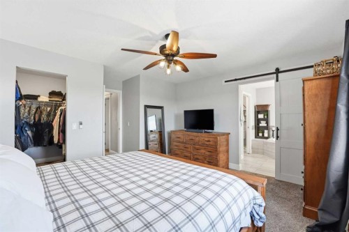 166 Fireside Bend, Cochrane, AB - Indoor Photo Showing Bedroom