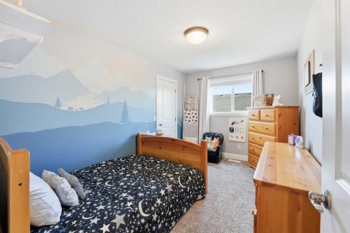 166 Fireside Bend, Cochrane, AB - Indoor Photo Showing Bedroom
