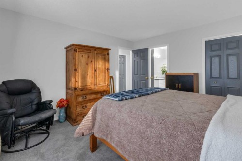 227 Harvest Gold Place Ne, Calgary, AB - Indoor Photo Showing Bedroom