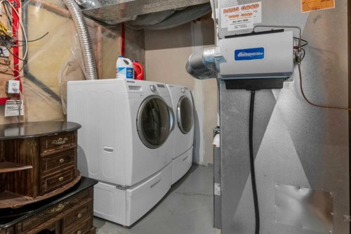 227 Harvest Gold Place Ne, Calgary, AB - Indoor Photo Showing Laundry Room