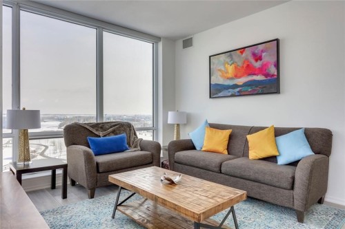 1107-615 6 Avenue Se, Calgary, AB - Indoor Photo Showing Living Room