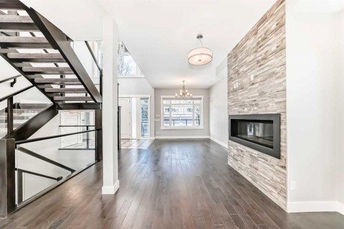 230 37 Street Nw, Calgary, AB - Indoor Photo Showing Living Room With Fireplace