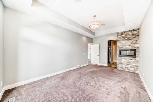 230 37 Street Nw, Calgary, AB - Indoor Photo Showing Other Room With Fireplace