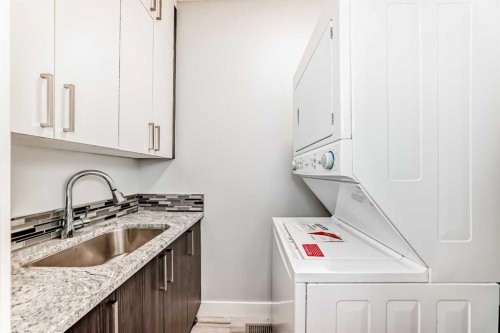 230 37 Street Nw, Calgary, AB - Indoor Photo Showing Laundry Room