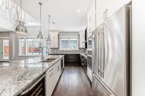 230 37 Street Nw, Calgary, AB - Indoor Photo Showing Kitchen With Double Sink With Upgraded Kitchen