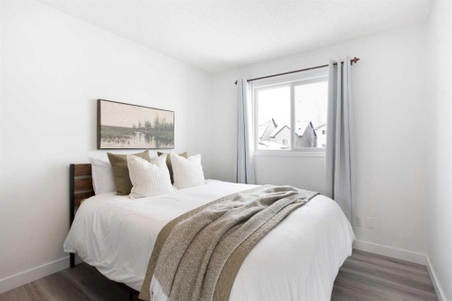 2348 Reunion Rise Nw, Airdrie, AB - Indoor Photo Showing Bedroom