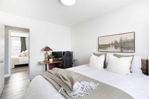 2348 Reunion Rise Nw, Airdrie, AB - Indoor Photo Showing Bedroom