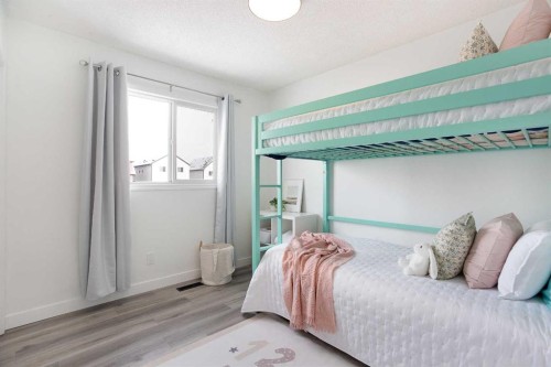 2348 Reunion Rise Nw, Airdrie, AB - Indoor Photo Showing Bedroom