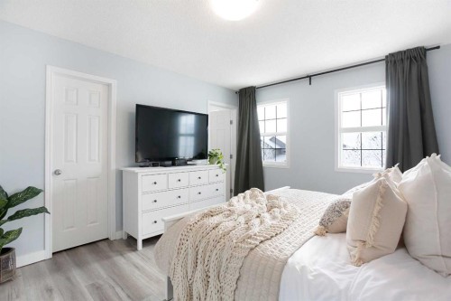 2348 Reunion Rise Nw, Airdrie, AB - Indoor Photo Showing Bedroom