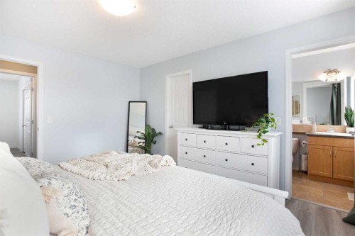 2348 Reunion Rise Nw, Airdrie, AB - Indoor Photo Showing Bedroom
